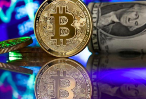 Bitcóin alcanza un nuevo récord al acercarse a los 54.000 dólares